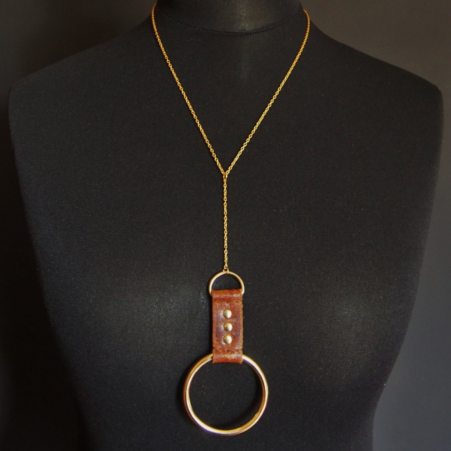 The Solar Necklace. Made from genuine leather and brass findings and inspired by the very skies above and the relationship between moon and sun. The Solar Necklace by Hord.