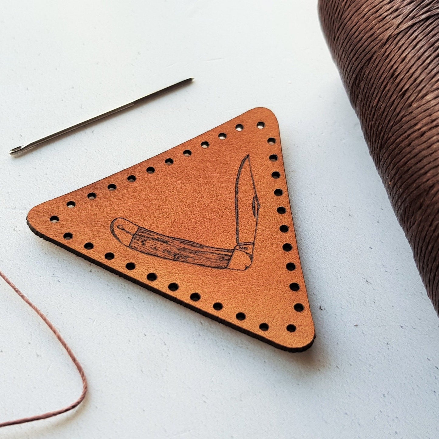 This bushcraft patch is hand dyed and engraved with a pocket knife - the perfect gift for whittlers, foragers, scouts and survivalists