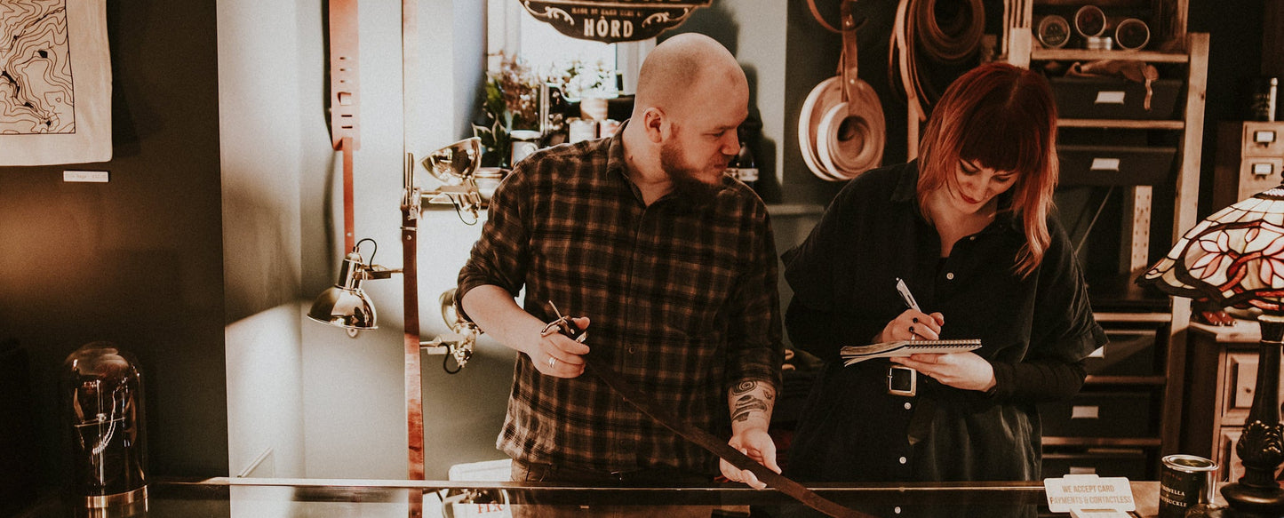 Gemma and Jason working in their shop in Marsden