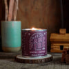 A lit bonfire inspired candle, perfect for autumn