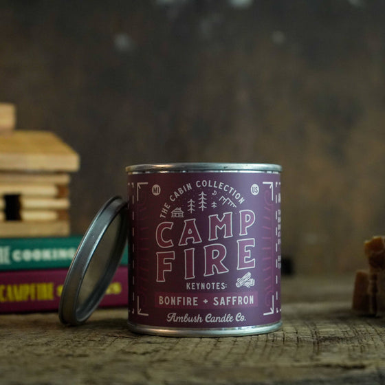 Scented candle in a tin, with notes of bonfire and saffron