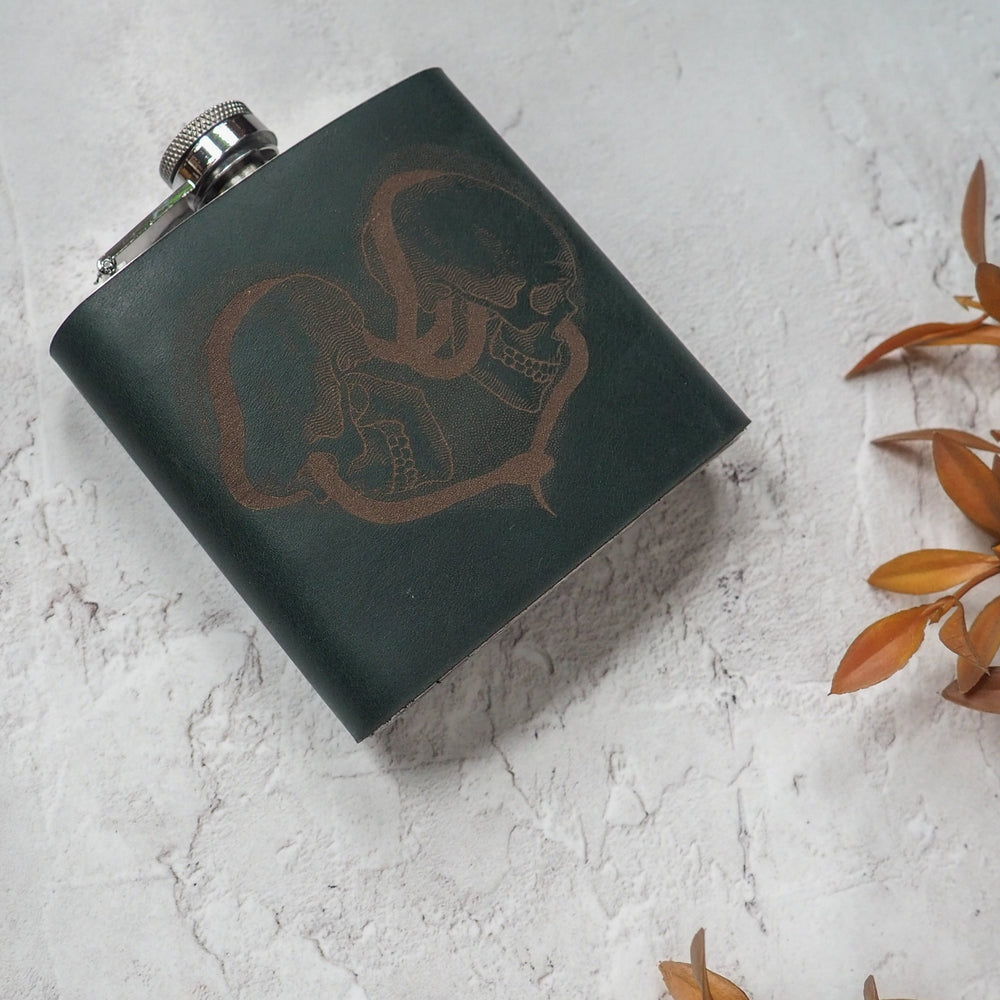 
                  
                    Personalized hip flask with Love Entwined skulls and snakes
                  
                