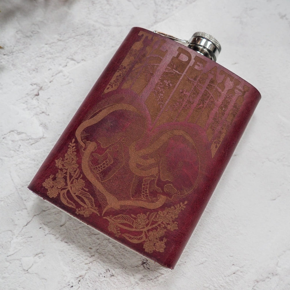 
                  
                    Vintage-inspired stainless steel hip flask adorned with a late 60s psychedelic illustration.
                  
                