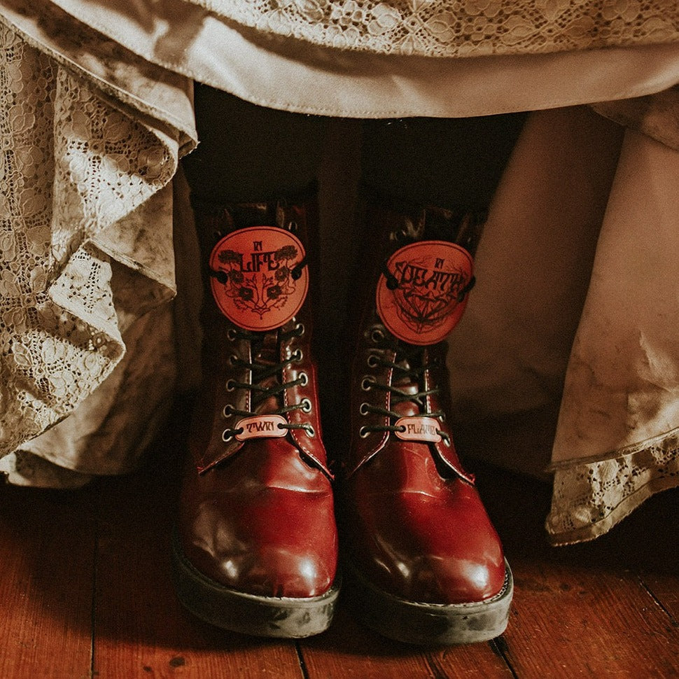 
                  
                    In Life and In Death, Leather Shoe Charm
                  
                