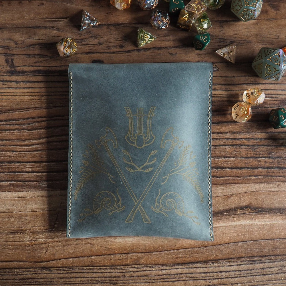 
                  
                    The back of our Genuine Leather Dice Bag, features harp, great axe, battle horn and leaves
                  
                