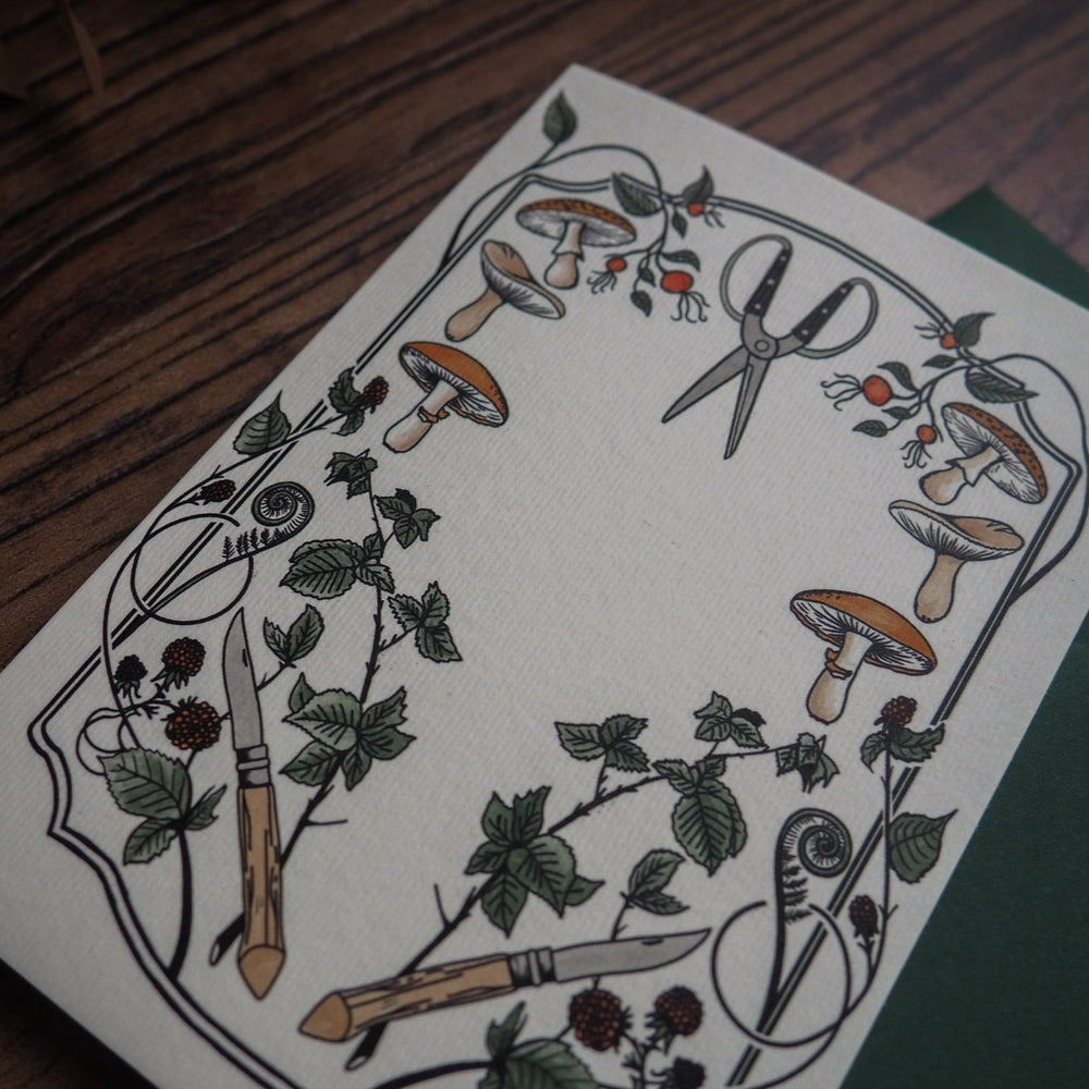 
                  
                    Nature-inspired Greeting Card - Pruning shears, mushrooms, and blackberries adorn this beautiful card
                  
                