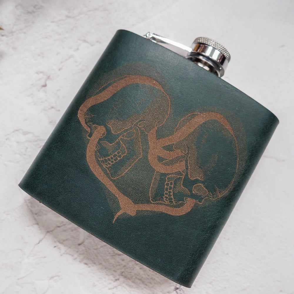 
                  
                    Stainless steel hip flask featuring Love Entwined design
                  
                