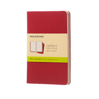 Red Moleskine notebook  on a white background