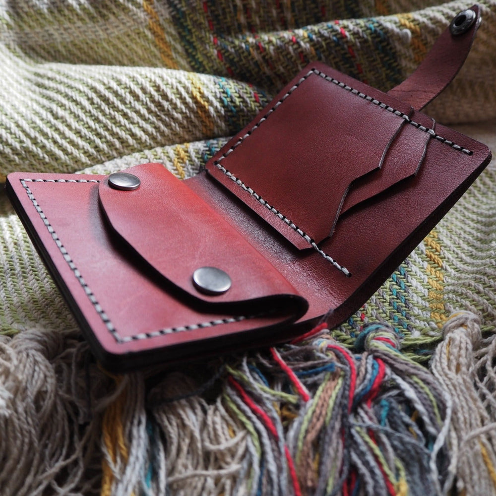 
                  
                    Closer look at the hardware on the Compact Mountain Purse, a personalised leather purse.
                  
                