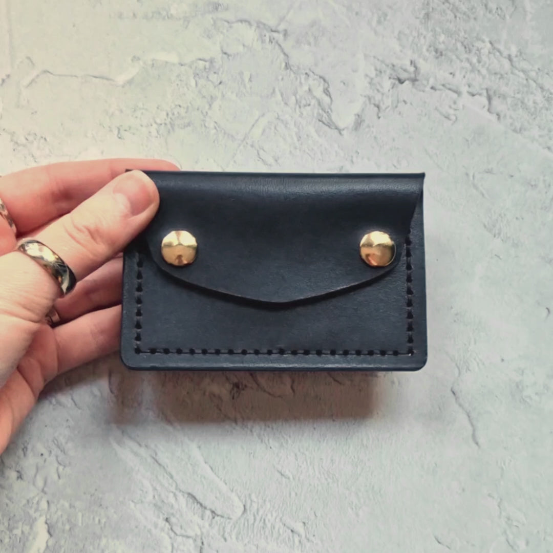 The minimalist wallet, hand stitched and hand dyed, with  our mountain card holder, note section and coin purse. By hord