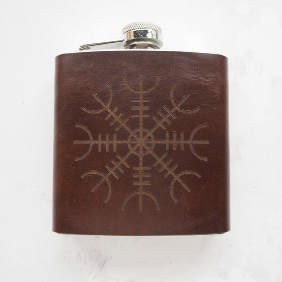 This viking flask is engraved with the aegishjalmur symbol.