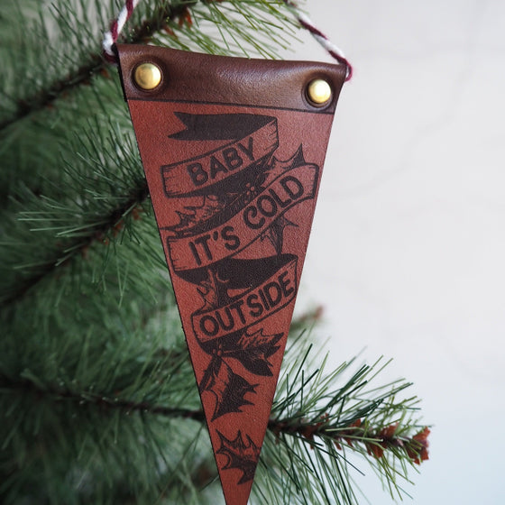 Closer look at the engraving on the 'Baby It's Cold Outside Christmas Decorations' by Hord.