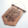 This Born of the North is leather banner is the perfect addition to your home and would allow you show off your Northern pride! A leather decoration from Hord.
