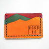 This vintage card holder has been hand dyed and hand stitched at our studio.