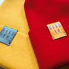 Closer look at the retro beanie hat in red and yellow.