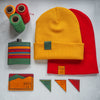 Our limited edition collection which comprises of our retro beanie hat, corner bookmarks, card holder, and hip flask.