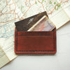 A luxury leather card holder with 3 compartments.