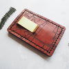 Closer look at the money clip and custom road map engraving on the personalised card holder.