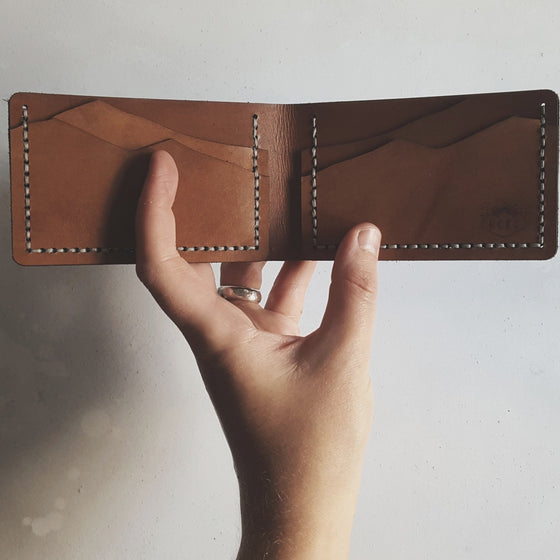 This engraved wallet, the Custom Topography Slim Mountain Wallet is hand dyed and hand stitched in your choice of colours.