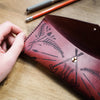 The Dungeoneers Leather Pencil Case with stud closure.