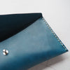 A personalised leather pencil case that's handcrafted in your choice of leather colour and stitch colour.