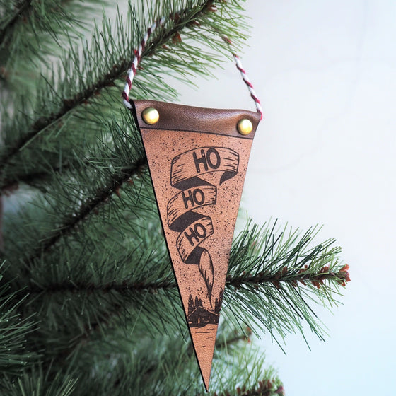 This Ho Ho Ho Christmas Decoration is made from luxurious leather and hand dyed. 