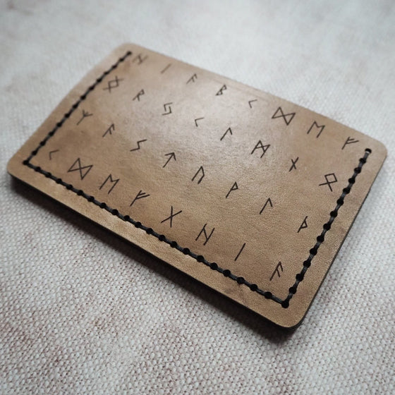 This Viking rune card holder, a Viking Wallet has been hand dyed and hand stitched at our studio.