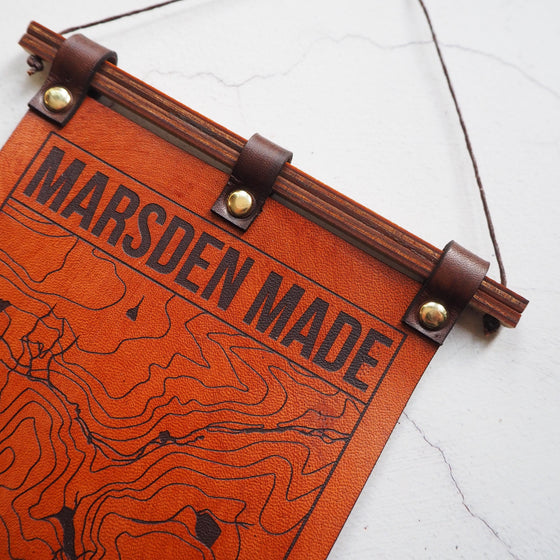 Closer look at the engraving of the Marsden Made banner, a luxury home decor from Hord.
