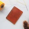 This Vertical Mountain Card Holder has been hand stitched in waxed linen thread.
