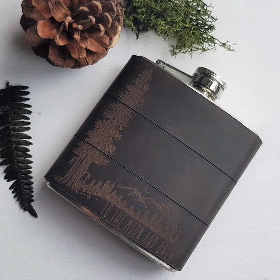 Mountain Man at Night Leather Flask, an engraved whiskey flask from Hord.