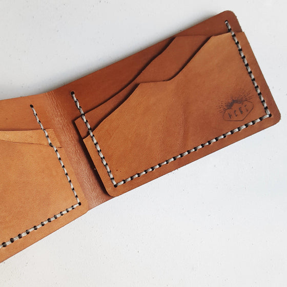 This Mountain Wallet, Slimline Bi-Fold features the silhoutte of mountains, making the perfect gift for the hiker or adventurer in your life.