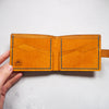 This Mountain Wallet with Clasp has its design featuring the silhouette of mountains.
