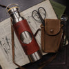 Mushroom Water Bottle - Stainless Steel 600ml. The leather wrap is engraved with a detailed illustration that explores the paterns of the frills of the splitgill mushroom. The leather wrap is dyed in burgundy. by Hord.