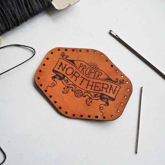 Northern Leather Patch, a vintage leather patch by Hord - This leather patch is hand dyed and engraved with a vintage style banner to showcase your northern pride.