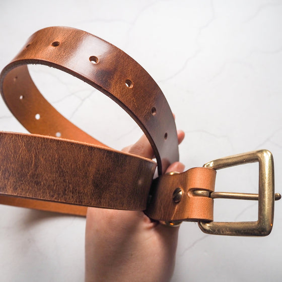 This tan leather belt is the perfect accessory for all your apparels.