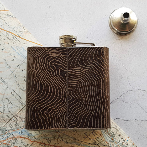 Posterior view of the contour lines engraved onto the Bespoke Hip Flask.