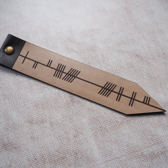 This personalised leather bookmark has been hand dyed in antique leather colour.