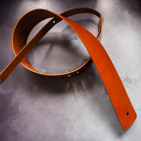 Full view of the Personalised Thick Leather Guitar Strap in Tan.