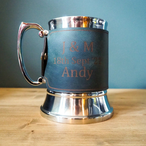 This Personalised Wedding Party Tankard features the name of the married couple along with date and name of recipient.