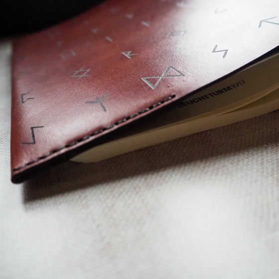 The Rune Leather Notebook Cover bound onto a leuchtturm1917 journal.