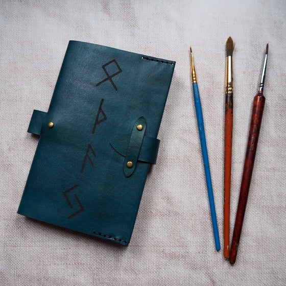 The Rune Pocket Journal hand dyed on blue leather colour.