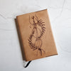 The Dagger Journal by Hôrd featuring a dagger and two snakes coiled around it. 