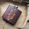 This monogram leather flask is engraved with a custom initial and our signature acorn leaf design.