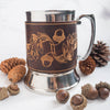 This engraved tankard is made from luxurious leather and wrapped around an insulated steel tankard.