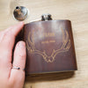 This Stag Hip Flask from Hord features an engraving of an antler along with a custom name and date.