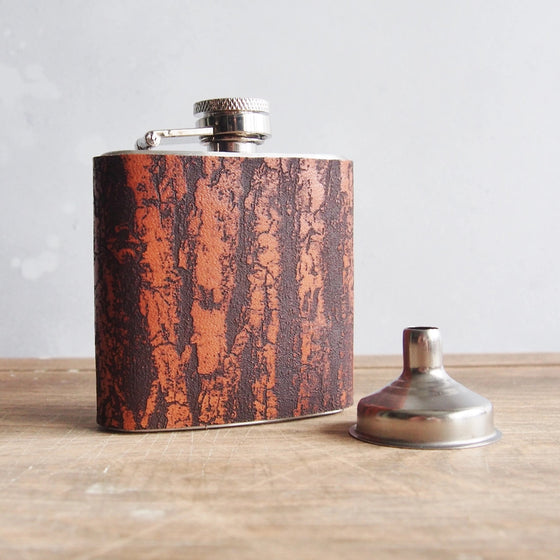 The Bark Leather Flask, a personalized engraved flask from Hord.