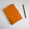 The Bee Journal, a custom leather notebook by HÔRD.