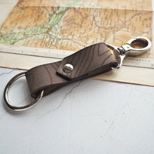  This luxury leather key ring is engraved with the contour lines of Ben Nevis, making the perfect gift for the hiker in your life. 