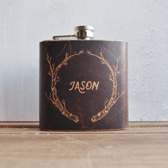 This groomsman hip flask is engrved with a birch branch which represents starting afresh, renewel in the Celtic folklore. 