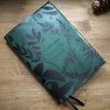 Green leather journal cover featuring Hôrd's botanical designs personalised with a custom text on the middle. 